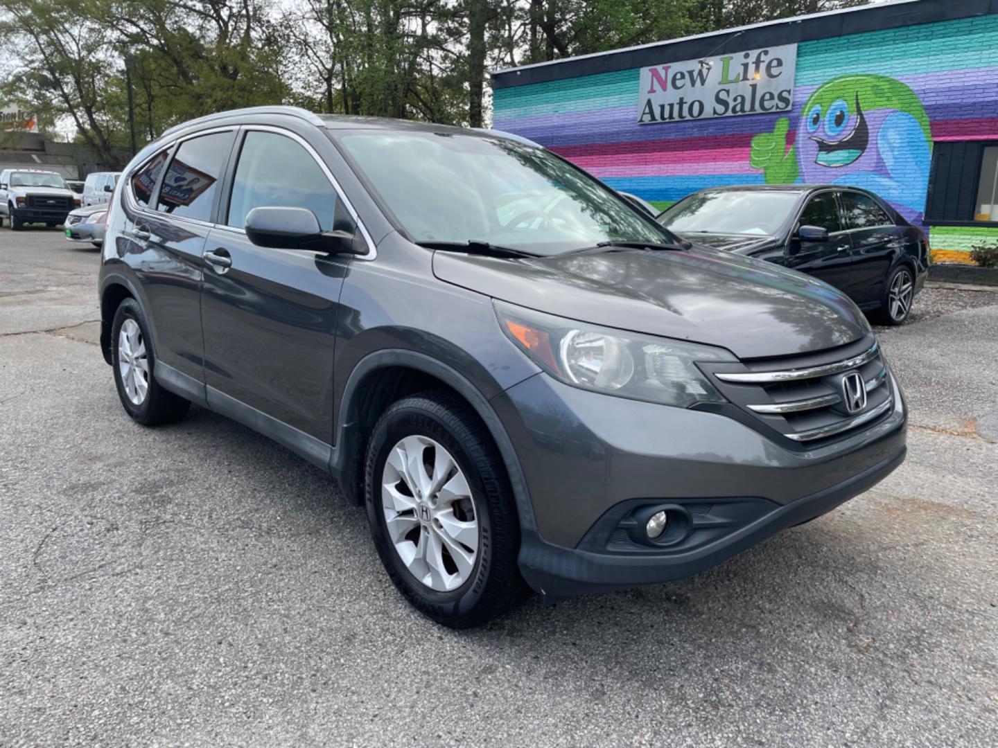 2014 GRAY HONDA CR-V EX-L (2HKRM3H73EH) with an 2.4L engine, Automatic transmission, located at 5103 Dorchester Rd., Charleston, SC, 29418-5607, (843) 767-1122, 36.245171, -115.228050 - Clean interior with Leather, Sunroof, Backup Camera, 6-Disc CD/AUX/Sat, Hands-free Phone, Dual Climate Control, Power Everything (windows, locks, seats, mirrors), Heated Seats, Keyless Entry, Alloy Wheels. Local Trade-in!! 188k miles Located at New Life Auto Sales! 2023 WINNER for Post & Courier's - Photo#0